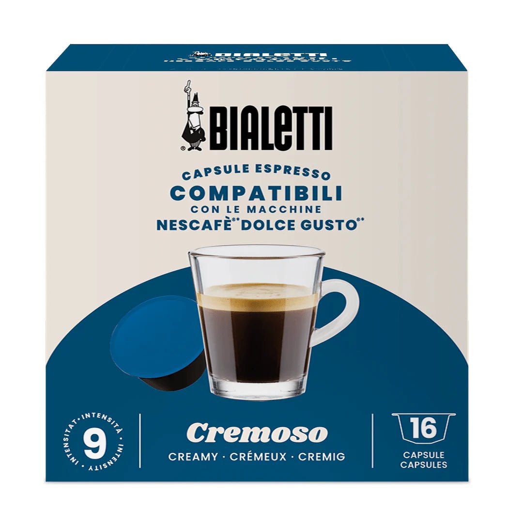 Bialetti Brew Italia Dolce Gusto compatible coffee capsules with creamy espresso flavor in a row on a white background.