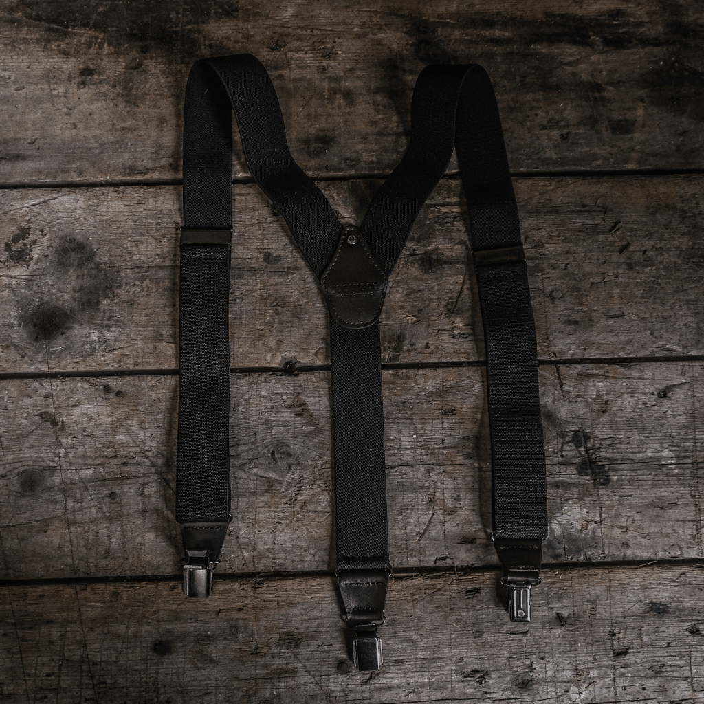 Heavy-duty black utility braces from Uggly and Co, designed as durable accessories for work or casual wear.