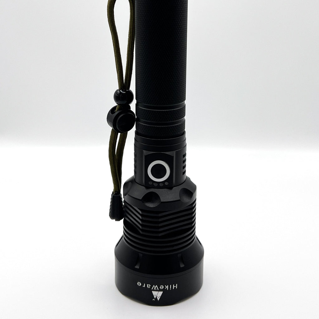 HikeWare waterproof LED flashlight with 10,000 lumens, zoomable focus, USB rechargeable, suitable for outdoor hiking and camping.