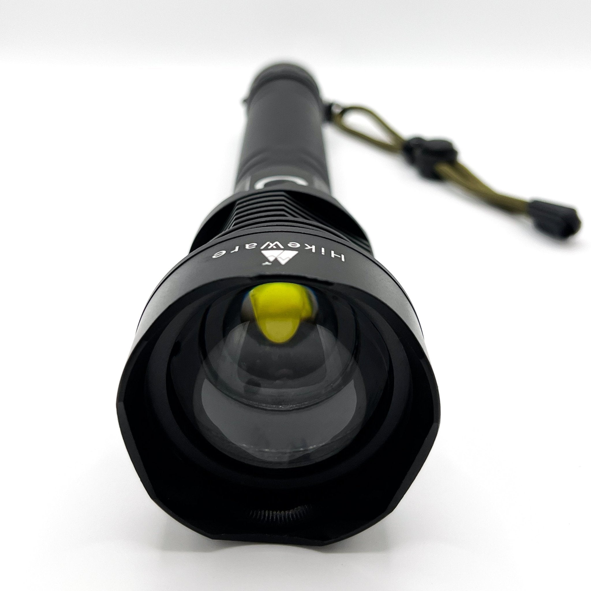 HikeWare waterproof LED flashlight with zoom feature, 10000 lumens brightness, rechargeable via USB, ideal for outdoor activities.