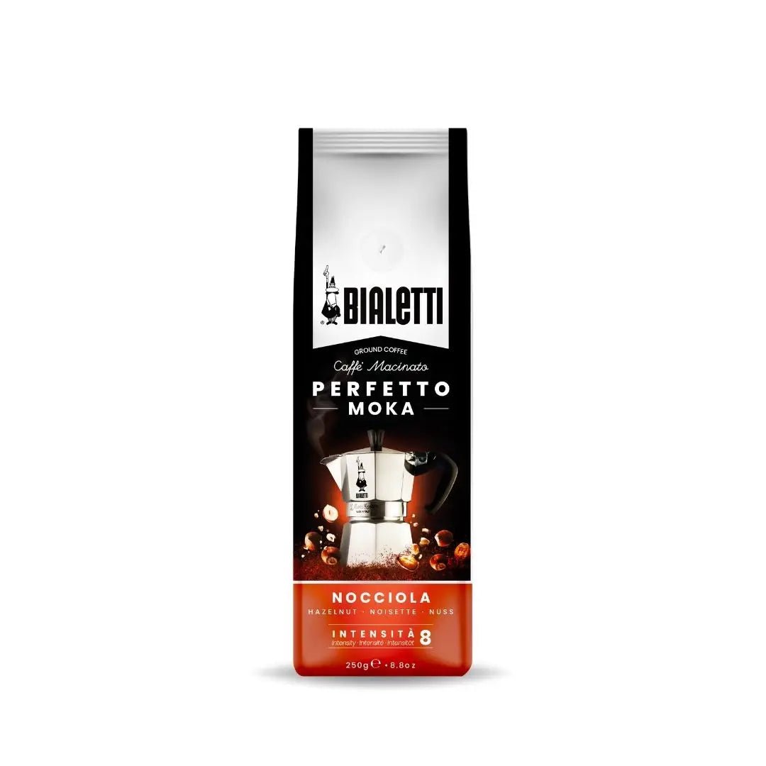 Bialetti Perfetto Moka stovetop coffee maker with intense hazelnut Italian coffee beans in a bag.