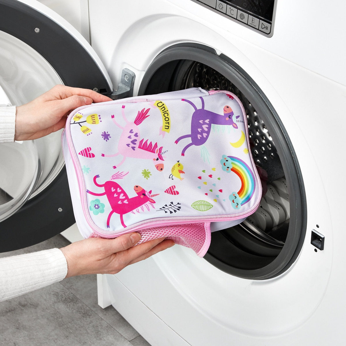 Kids insulated lunch bag by ION8 featuring colorful unicorn design, durable fabric, and a secure zip closure for lunch on the go.