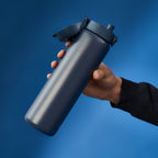 Ion8 1L leak-proof thermal water bottle in ash navy, insulated with a sleek design for hot or cold beverages.