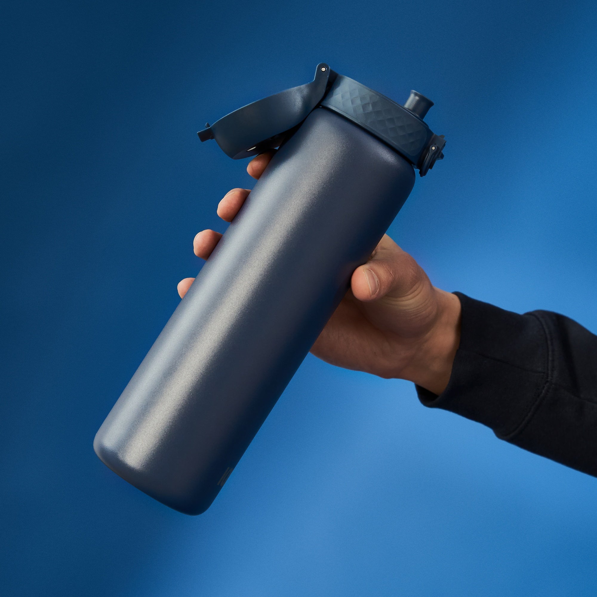 Ion8 1L leak-proof thermal water bottle in ash navy, insulated with a sleek design for hot or cold beverages.