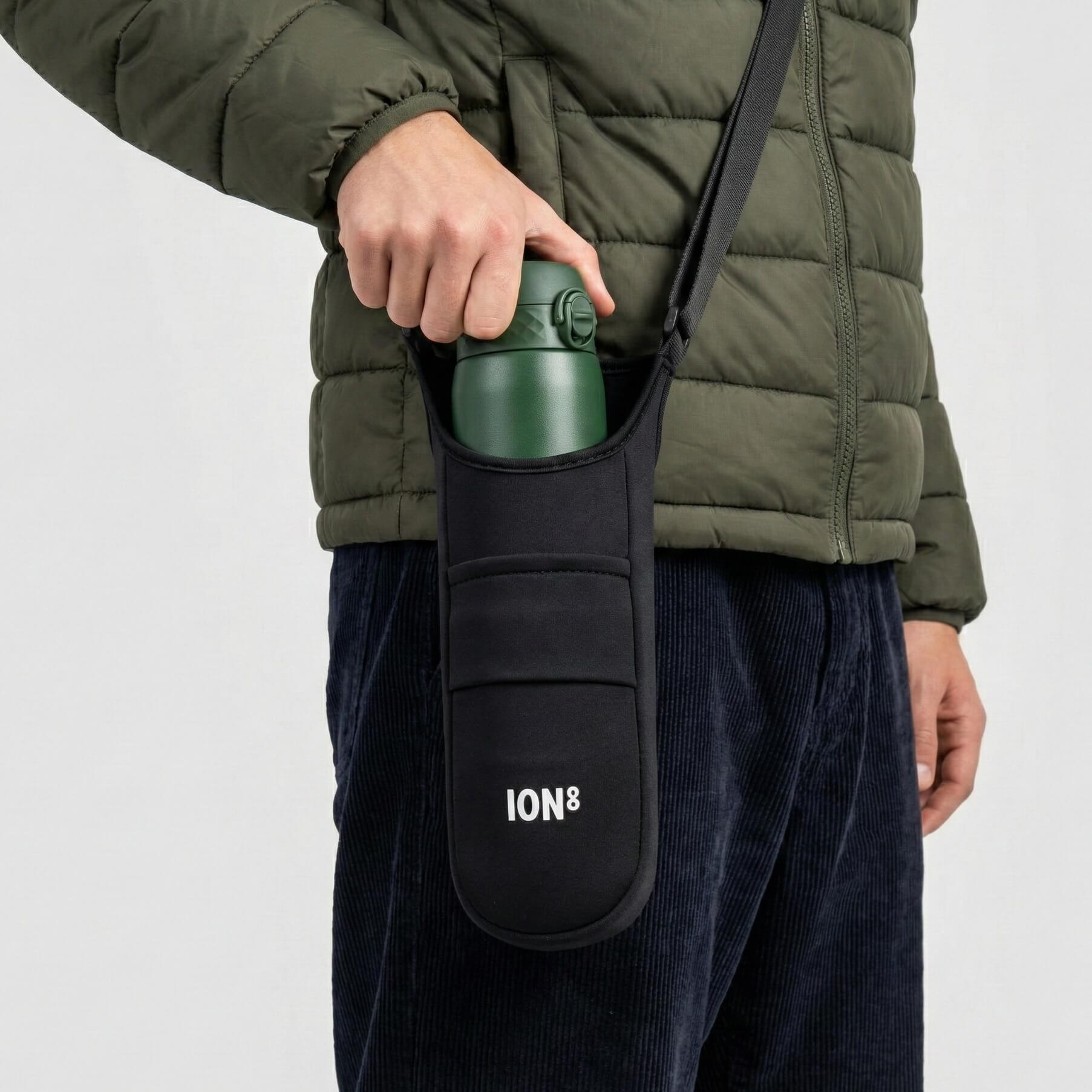 Black ION8 lightweight sling bottle bag with adjustable strap and compact design for carrying beverages on the go.