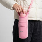 Pink ION8 lightweight sling bottle bag from Xtras & Add-Ons collection, designed for easy carrying and convenience.