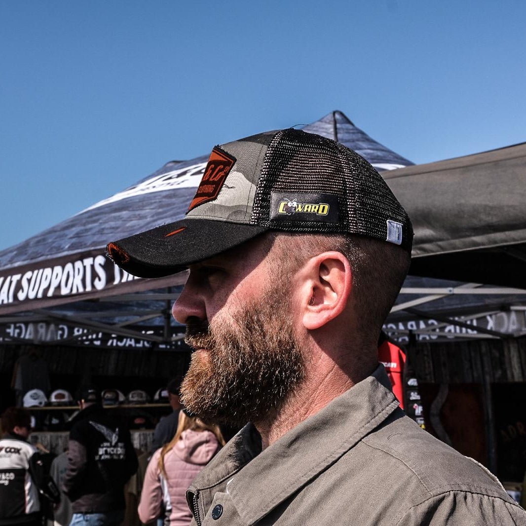 Grey camo diamond trucker cap by Uggly and Co featuring a classic snapback design and mesh back for breathability.