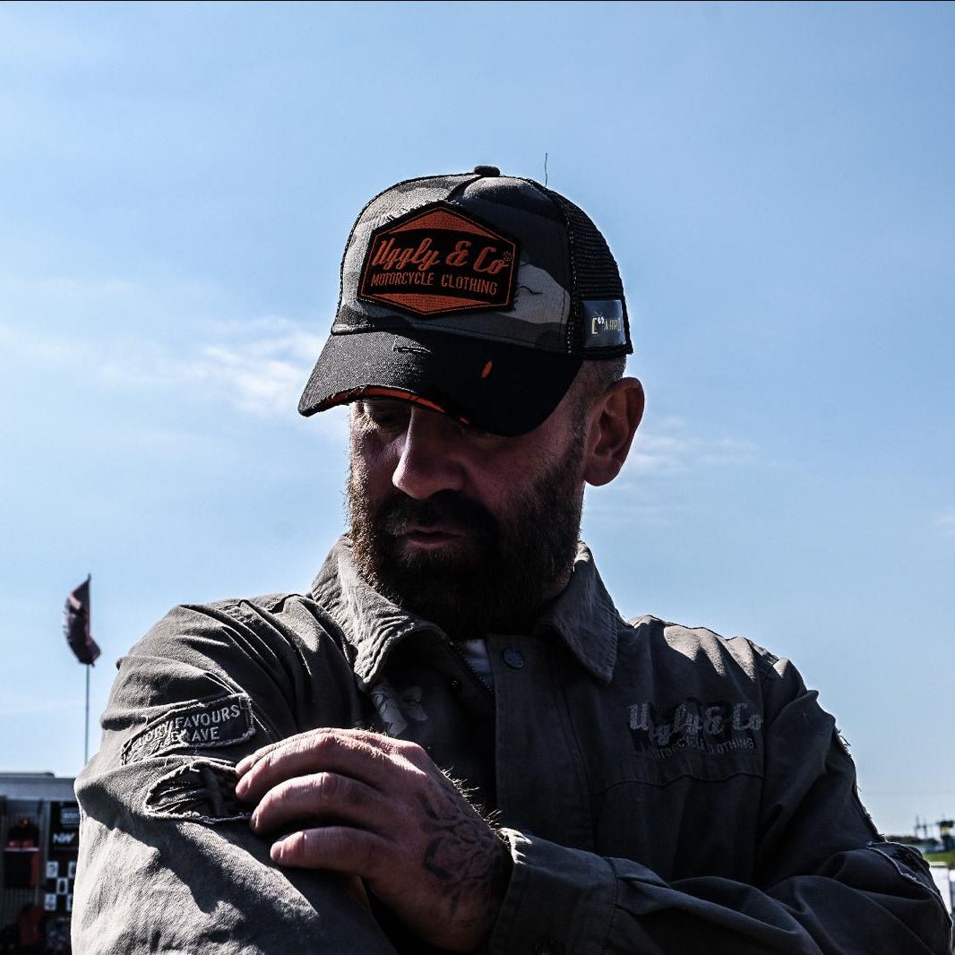 Grey camo diamond trucker cap by Uggly and Co featuring a classic mesh back and adjustable strap.