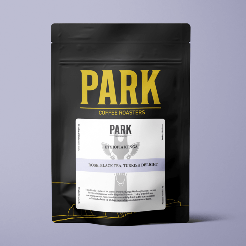 Roasted Ethiopia Konga coffee beans from Park Coffee, showcasing glossy brown beans in a close-up image.