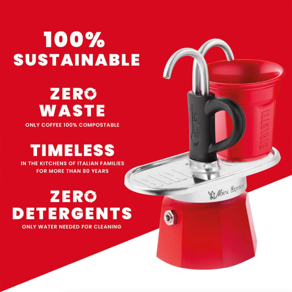Bialetti Mini Express 'R' double serve coffee maker brewing fresh Italian espresso in a kitchen setting.
