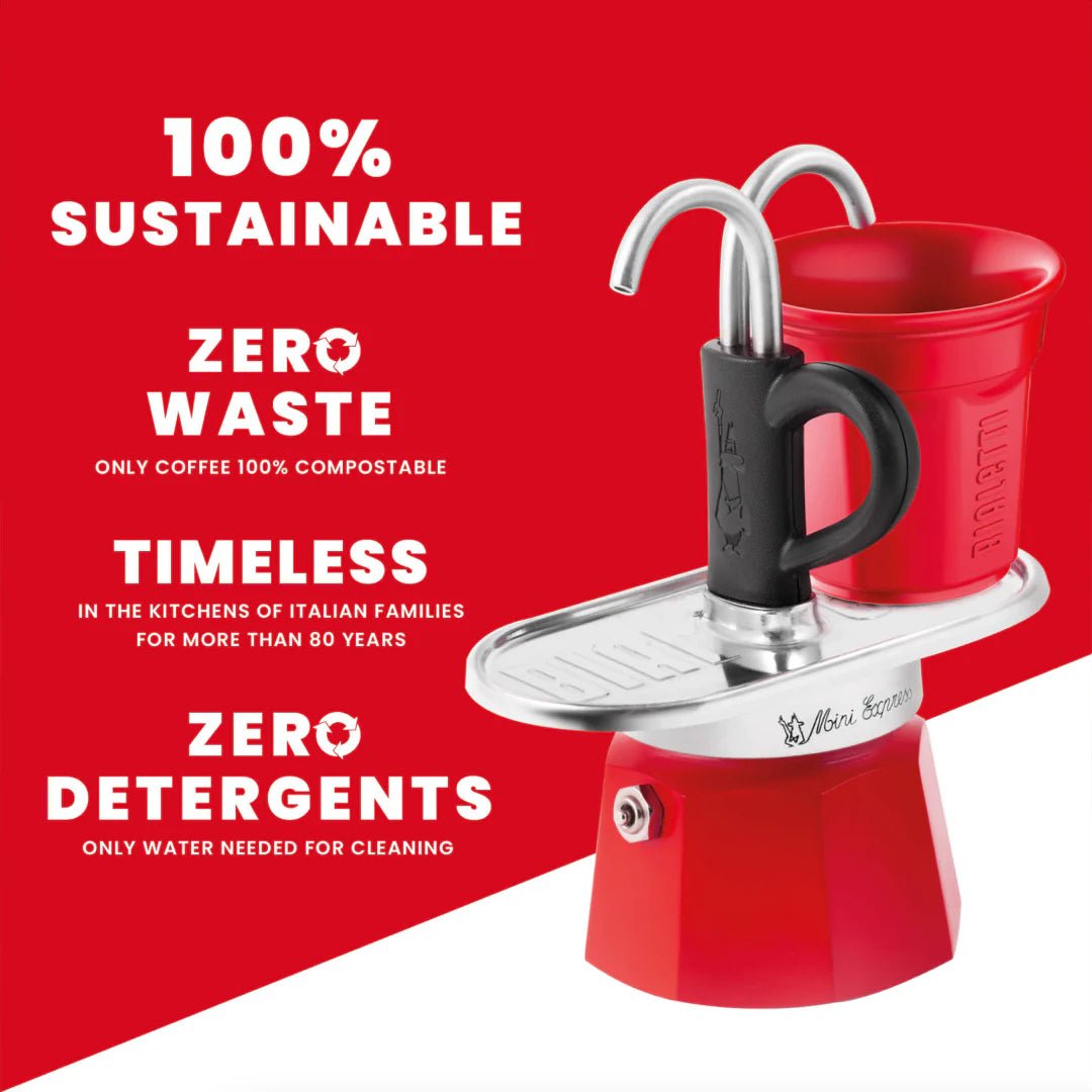Bialetti Mini Express 'R' double serve coffee maker brewing fresh Italian espresso in a kitchen setting.