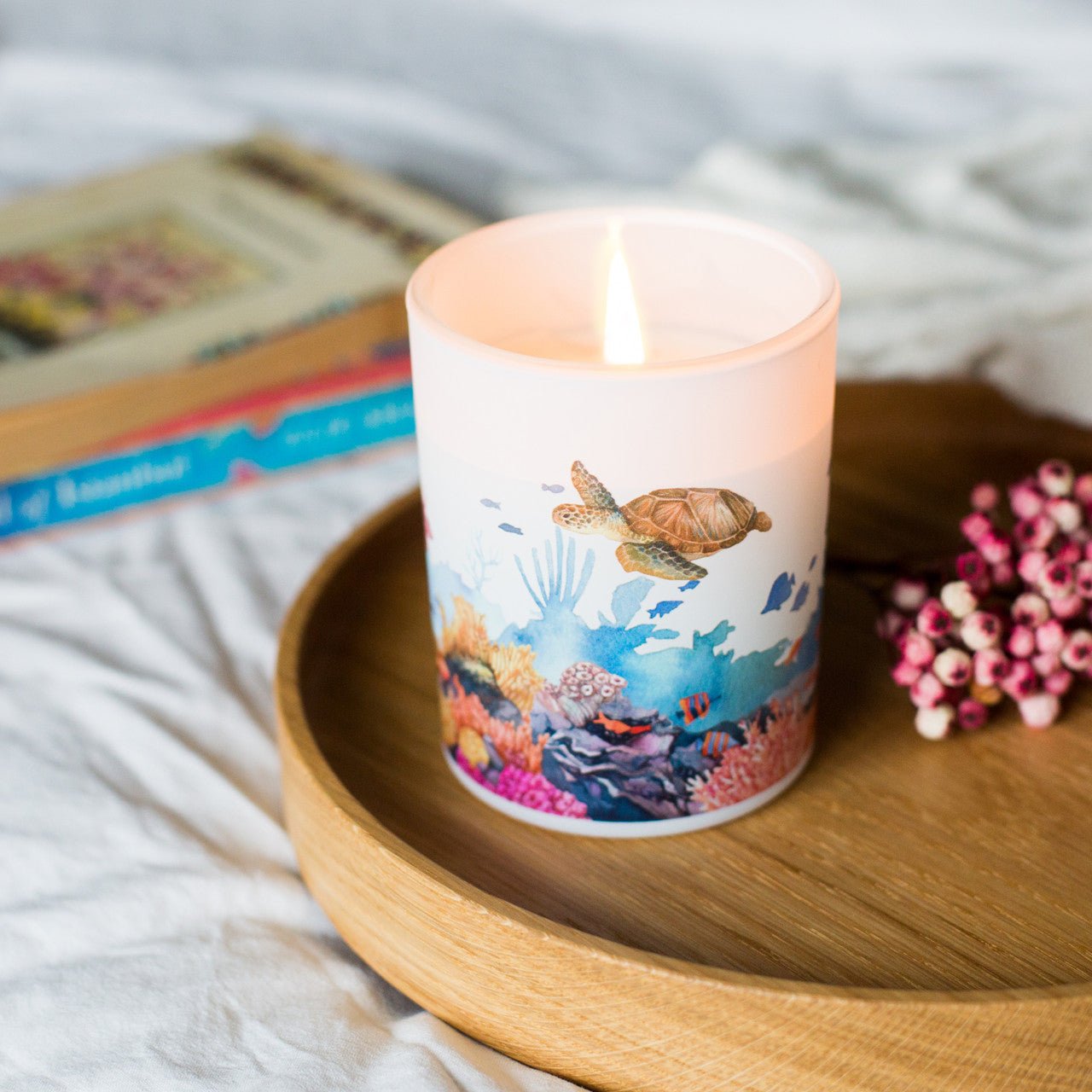 Trouvaille Marine Soy Scented Candle with fresh bergamot and vetiver, featuring a coastal-inspired design and warm, soothing glow.