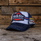 Retro blue and red diamond design trucker cap by Uggly and Co featuring a classic curved brim and adjustable mesh back.