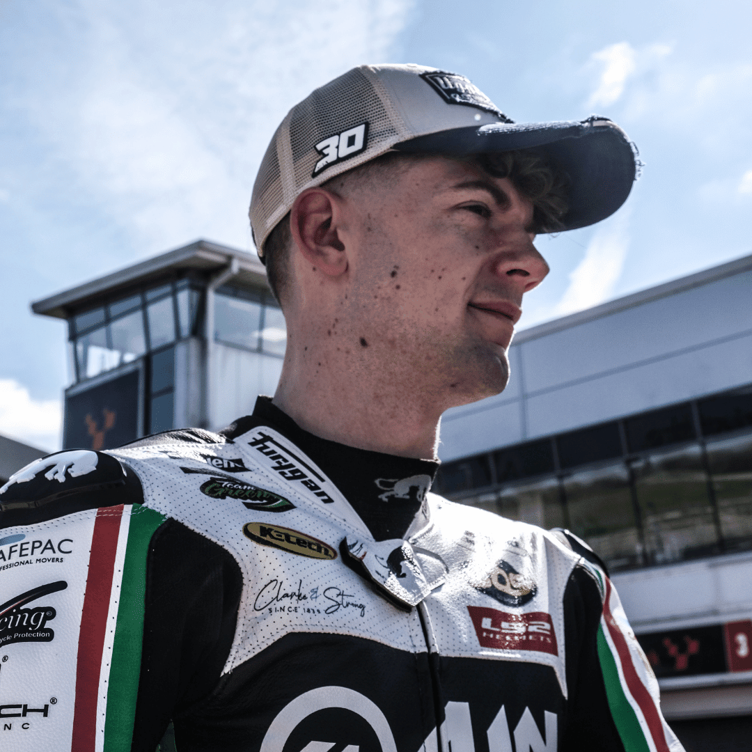 Max Cook Bimota Superbike rider wearing Uggly and Co Diamond Trucker Hat, featuring a stylish cap with diamond details.