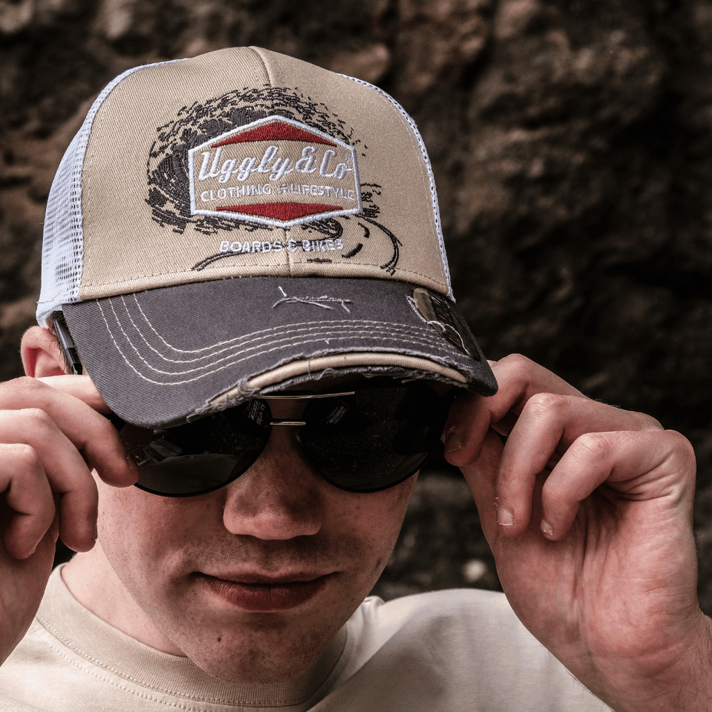 Beige Surf Diamond Uggly and Co men's trucker cap with mesh back and curved brim, casual biker style hat.