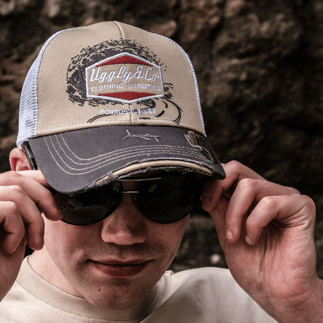 Beige Surf Diamond Uggly and Co men's trucker cap with mesh back and curved brim, casual biker style hat.