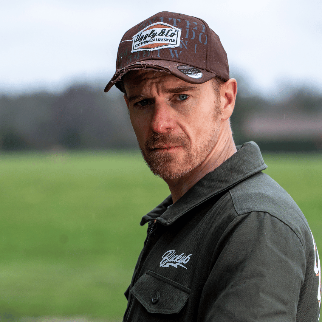 Men's brown distressed baseball cap with "Aviation" diamond embroidery by Uggly and Co, featuring a classic trucker hat design.
