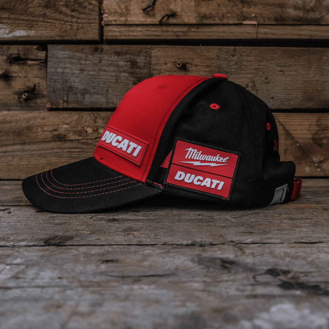 Milwaukee Tools x Ducati team-wear trucker hat featuring branding and logo on a baseball cap style hat.