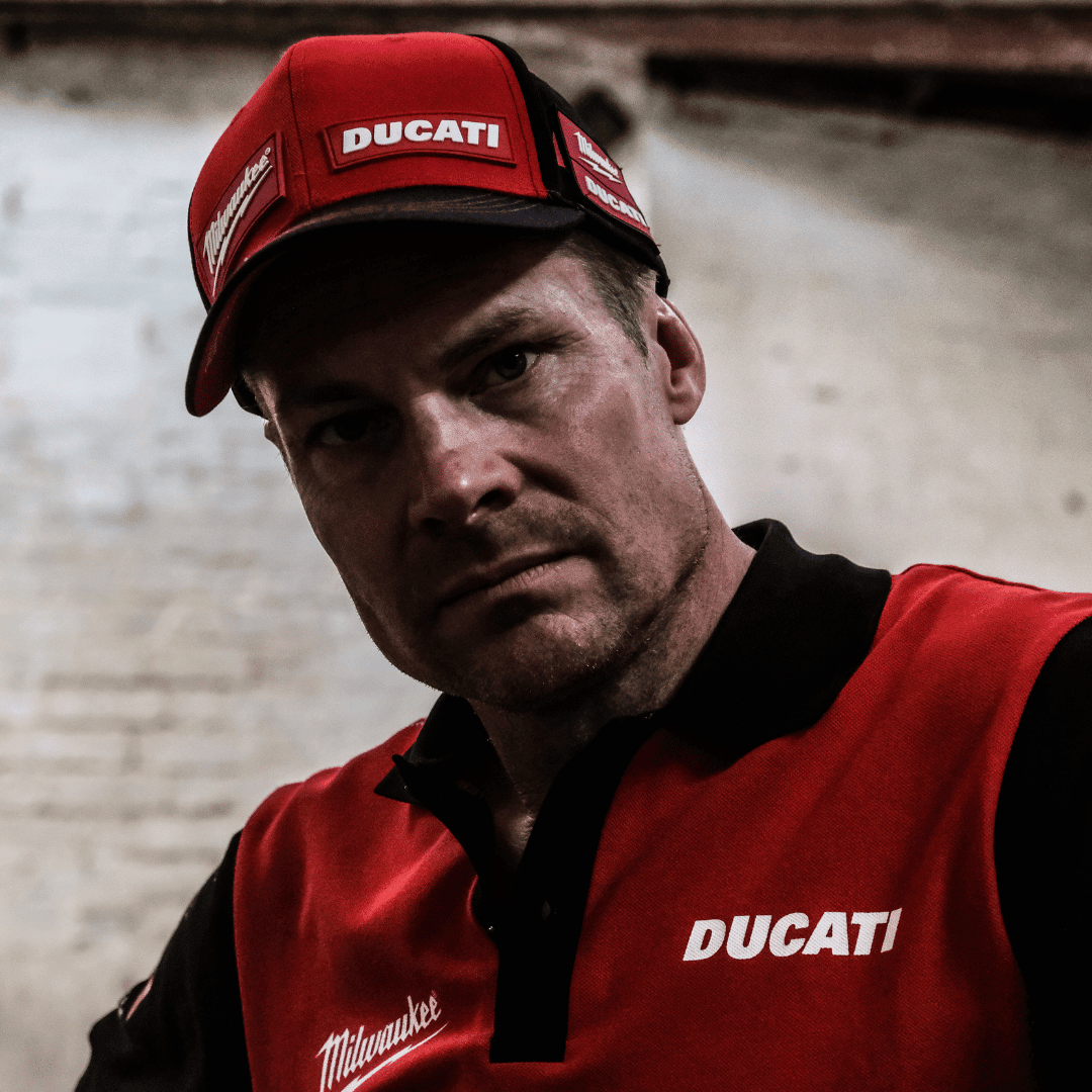 Milwaukee Tools and Ducati team-wear trucker hat featuring a structured baseball cap design with logo embroidery.