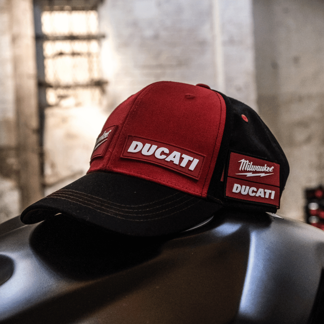 Milwaukee Tools x Ducati team-wear trucker baseball cap by Uggly and Co, featuring adjustable mesh back and embroidered logos.