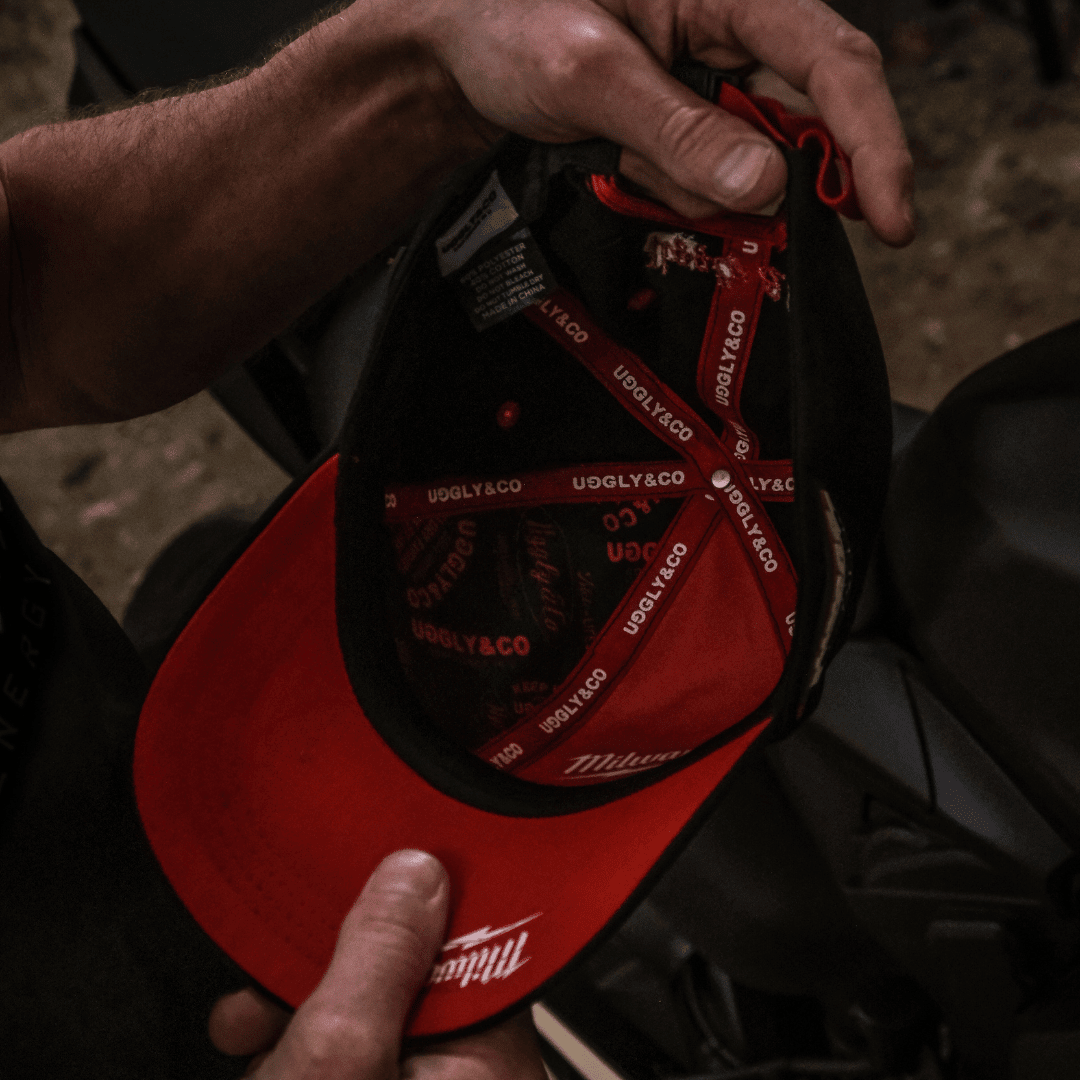 Diamond Trucker Hat by Uggly and Co featuring Milwaukee Tools branding, classic baseball cap style with diamond pattern design.