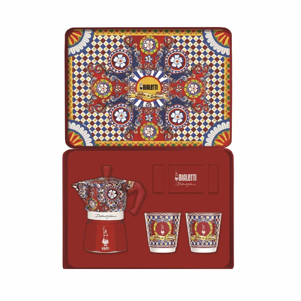 Bialetti Brew Italia Sicilian Cart gift set with 2-cup moka espresso, two cups, and gold stirrers in holiday-themed packaging