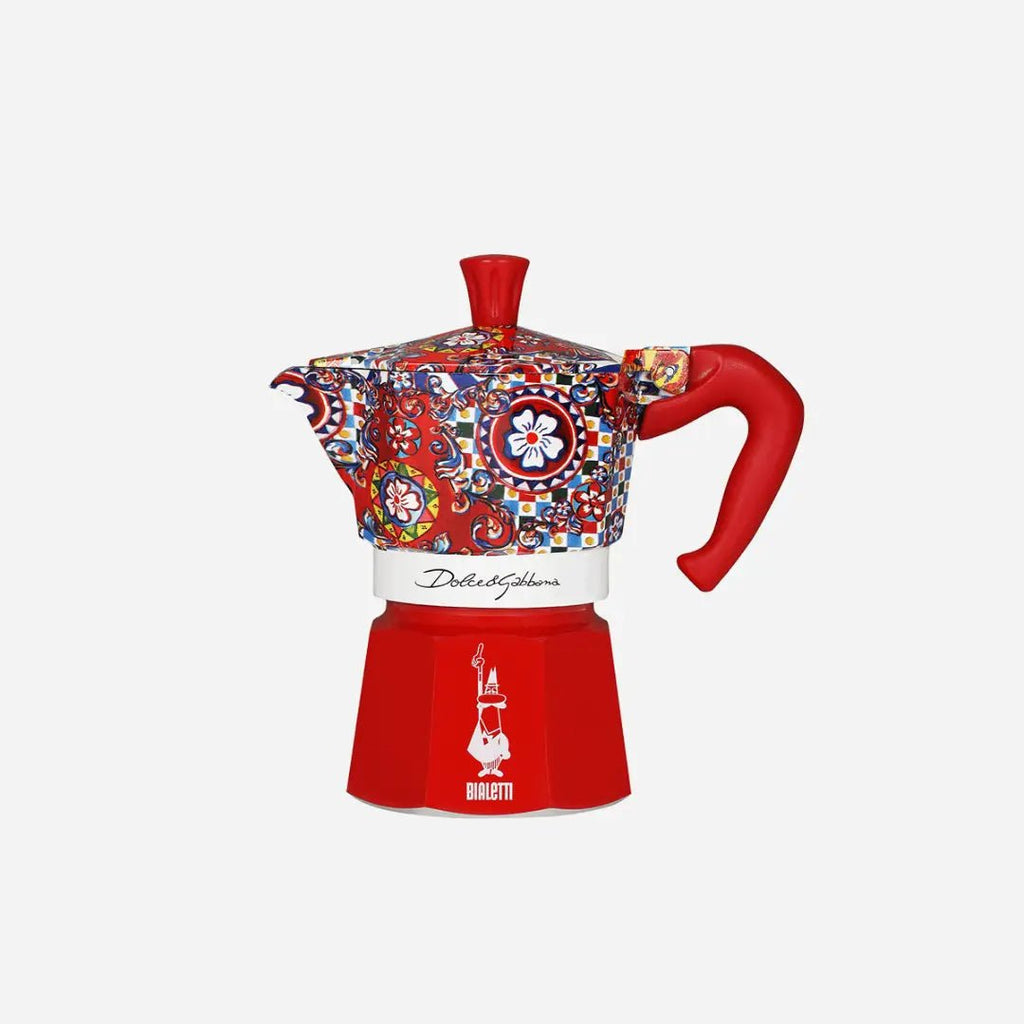 Bialetti Sicilian Cart Moka Express coffee maker with Dolce&Gabbana design, Brew Italia branded, featuring a stylish patterned exterior.