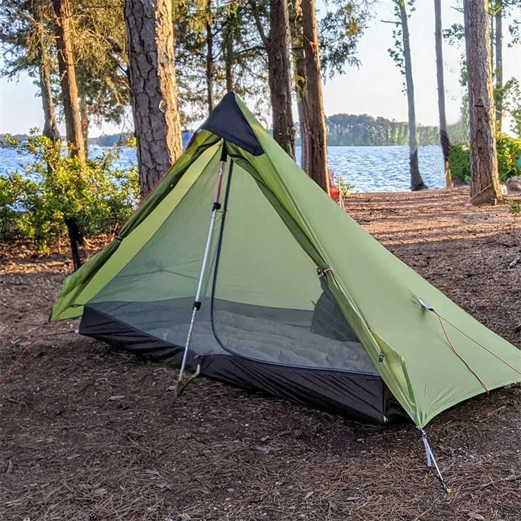 HikeWare Night Cat 1-Person Ultra Lightweight Backpacking Tent set up outdoors on a grassy area.