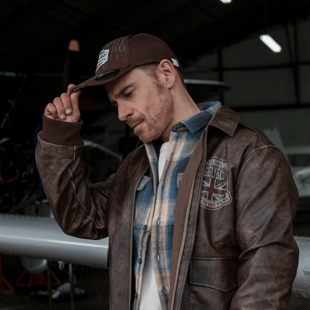 Brown Uggly and Co Aviation Diamond Trucker Hat with vintage motorcycle-inspired design and classic mesh back.