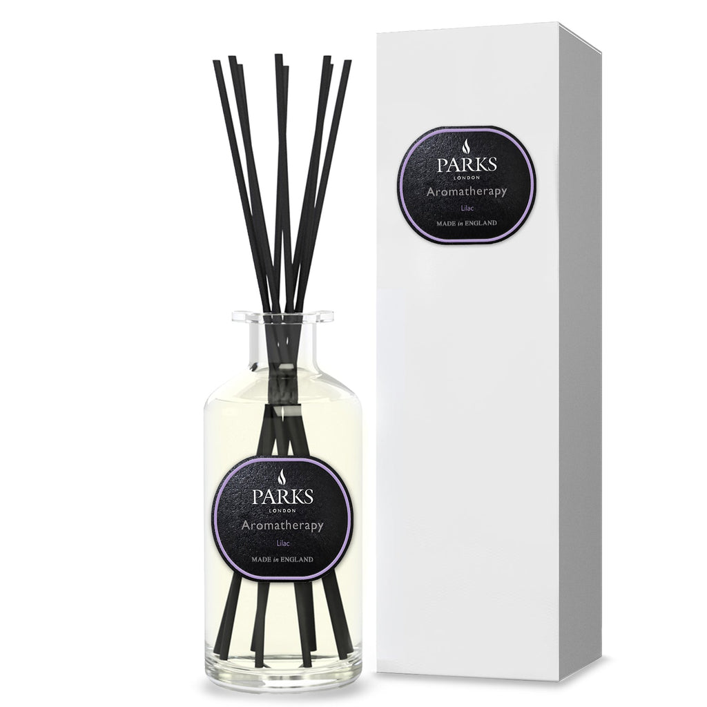 Lilac reed diffuser by Parks Candles in a 220ml glass bottle with reed sticks for home fragrance.