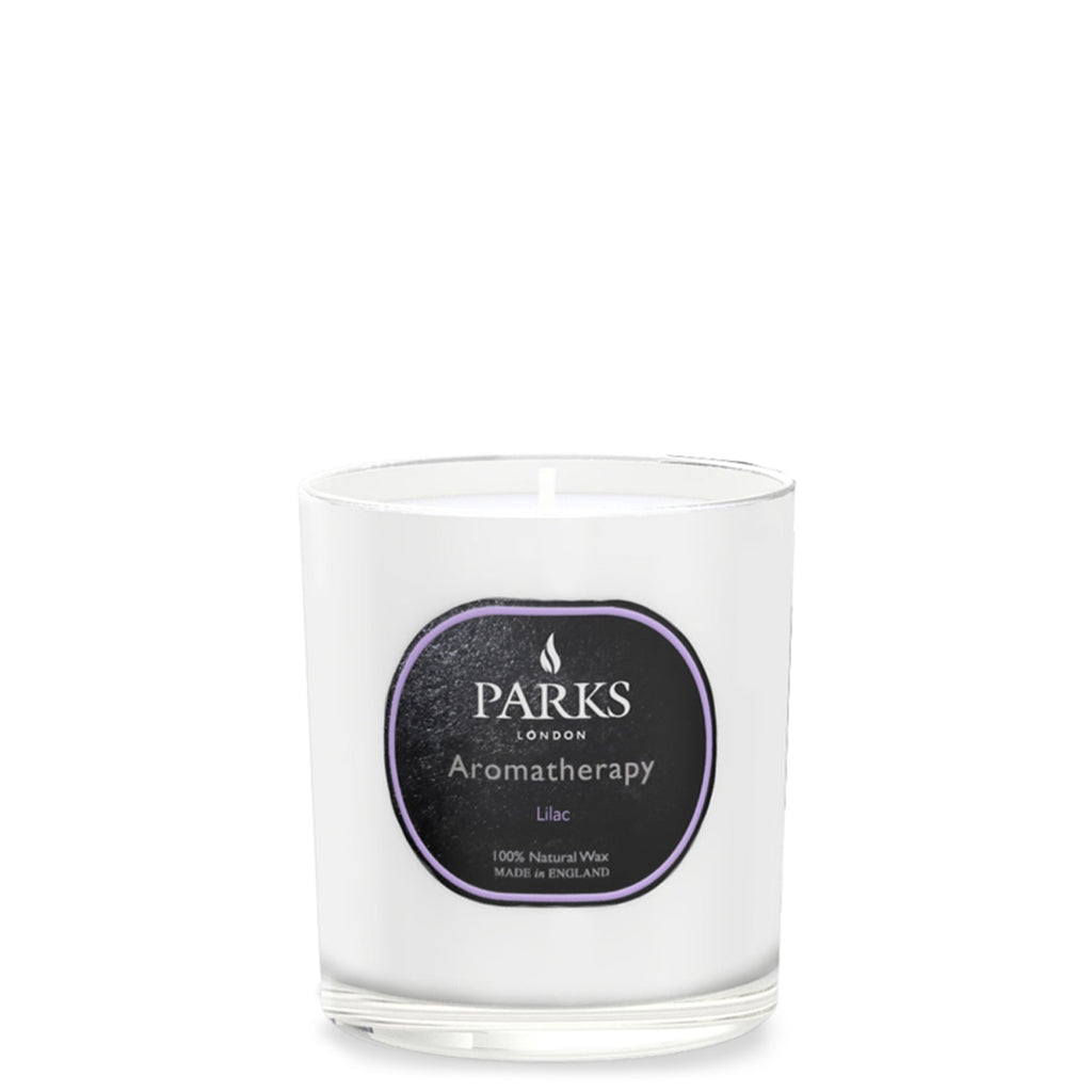 Parks Candles lilac scented candle in 220g glass jar, showcasing the soft purple color and elegant design.