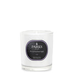 Parks Candles lilac scented candle in 220g glass jar, showcasing the soft purple color and elegant design.
