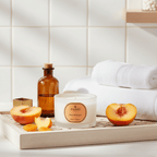 Parks Candles Peach & Amaryllis Travel Candle 70g with peach and floral design, perfect for on-the-go relaxing scent.
