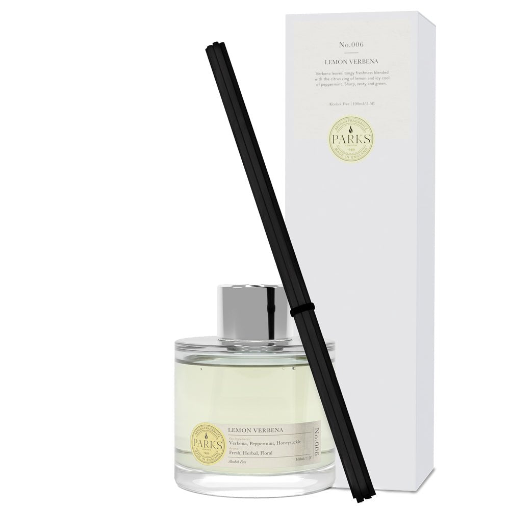 Lemon Verbena reed diffuser by Parks Candles with a 100ml glass bottle and natural reed sticks for fresh, citrusy scent.