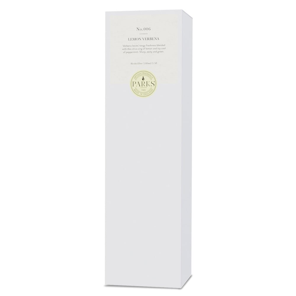 Lemon Verbena reed diffuser by Parks Candles in a clear glass bottle with natural reed sticks for fresh citrus scent.