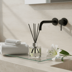 White Hyacinth and Lily reed diffuser by Parks Candles in a 100ml glass bottle, featuring fresh floral scent and decorative reeds.