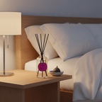 Reed diffuser by Parks Candles with Wild Fig, Cassis, and Orange Blossom scent in a 220ml glass bottle.