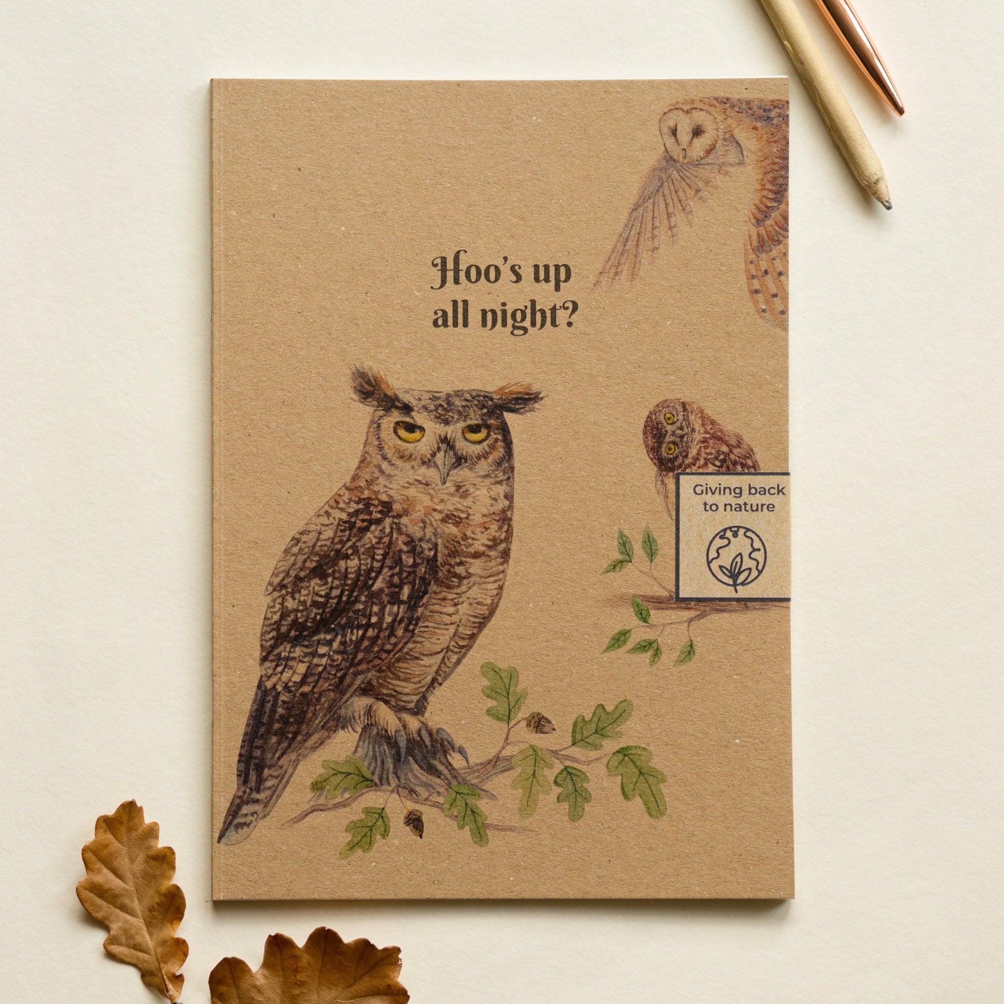 Trouvaille recycled paper notebook with illustrated owl cover, featuring a detailed owl design on the front.