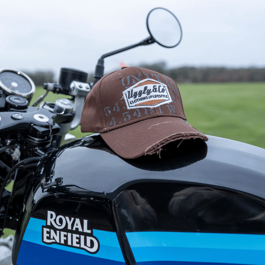 Brown Uggly and Co Aviation diamond trucker hat with mesh back and embroidered front, vintage-style baseball cap for casual wear