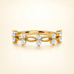 Vianne Jewellery Alana ring in 18k gold-plated sterling silver, close-up of the elegant ring on warm ivory background