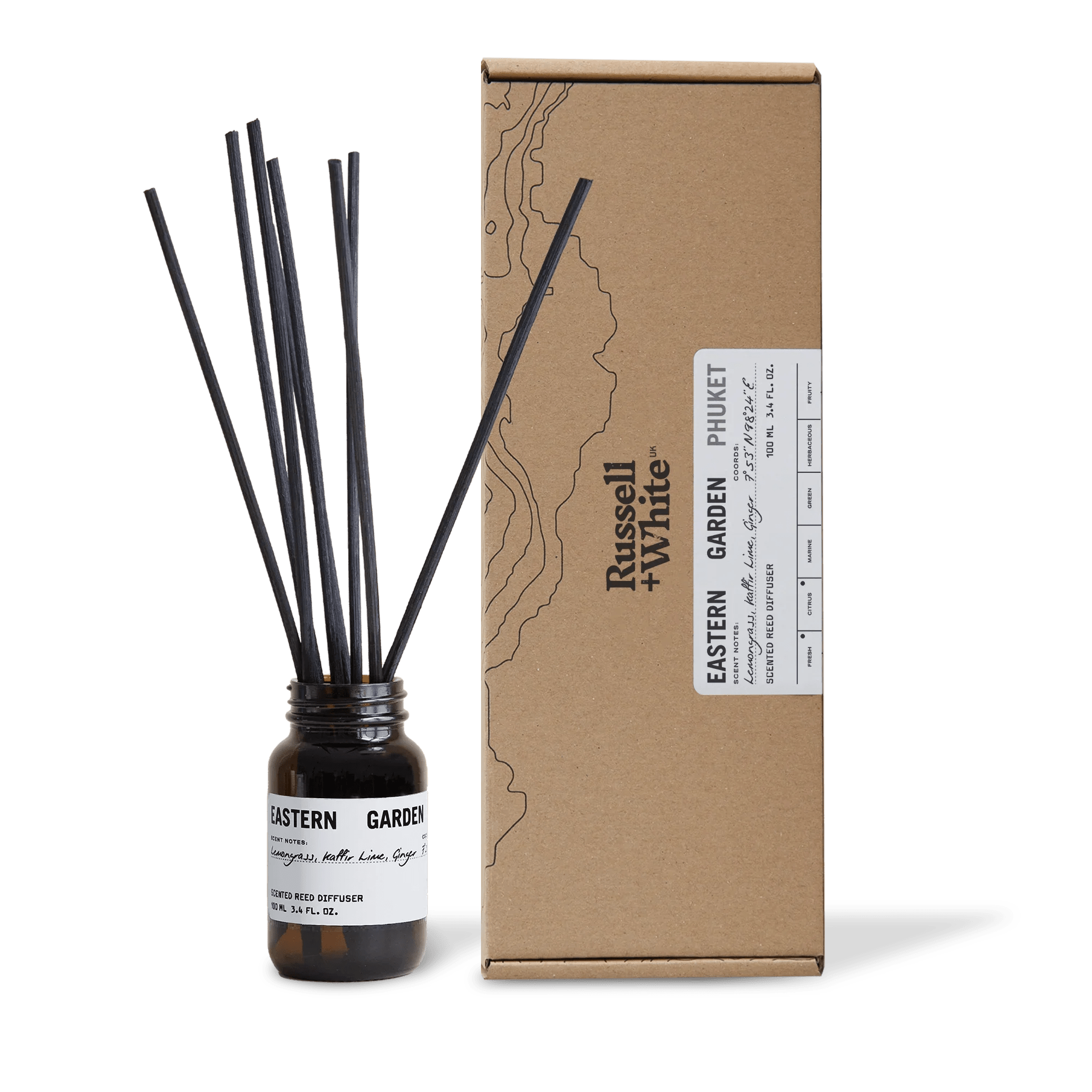 Russell + White Eastern Garden 100ml reed diffuser with decorative glass bottle and natural reed sticks for home fragrance.