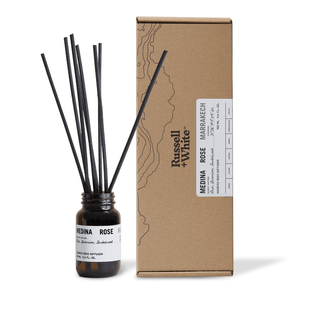 Russell + White Medina Rose 100ml reed diffuser with elegant glass bottle and natural reed sticks for home fragrance.