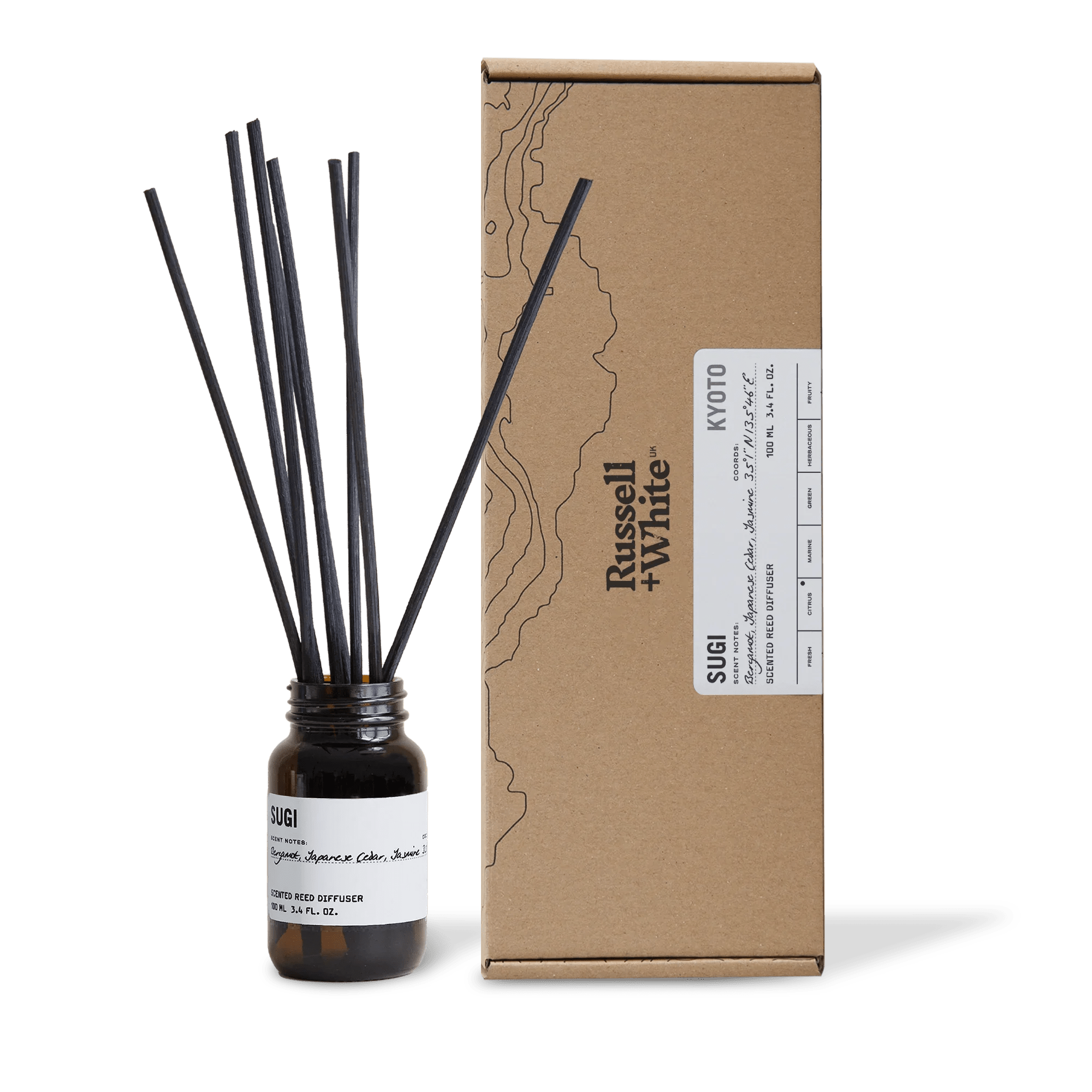 Russell + White Sugi 100ml reed diffuser with elegant glass bottle and reed sticks for home fragrance.