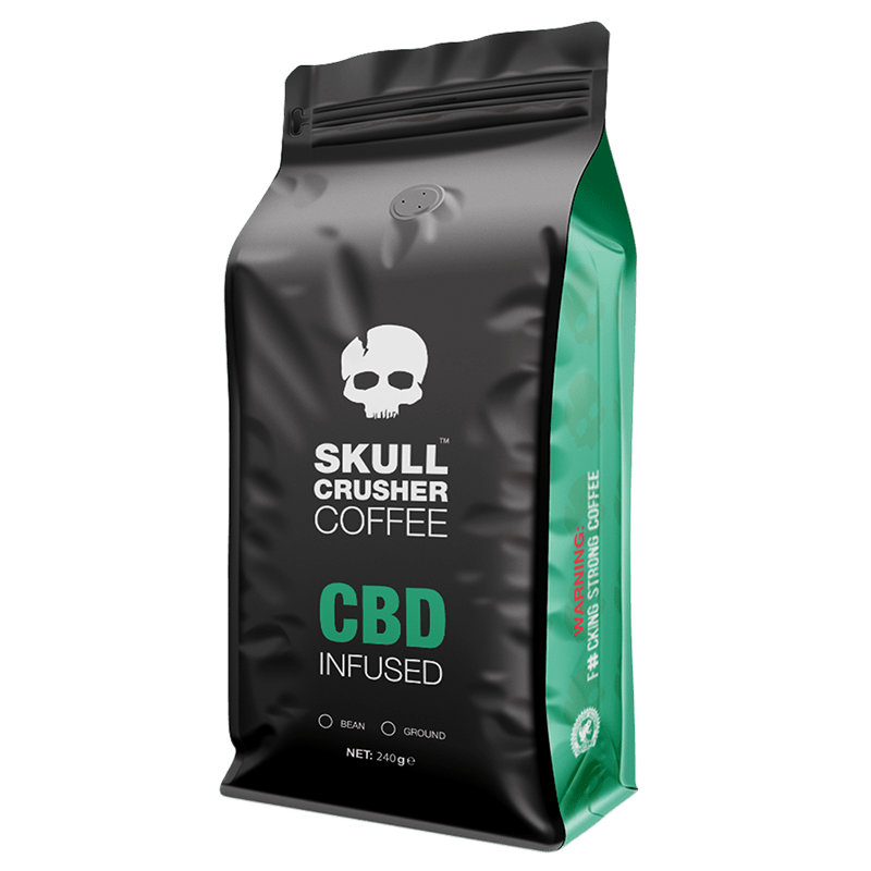 Skull Crusher Coffee infused with CBD, showing a dark roasted coffee bag with skull logo and vibrant branding elements.