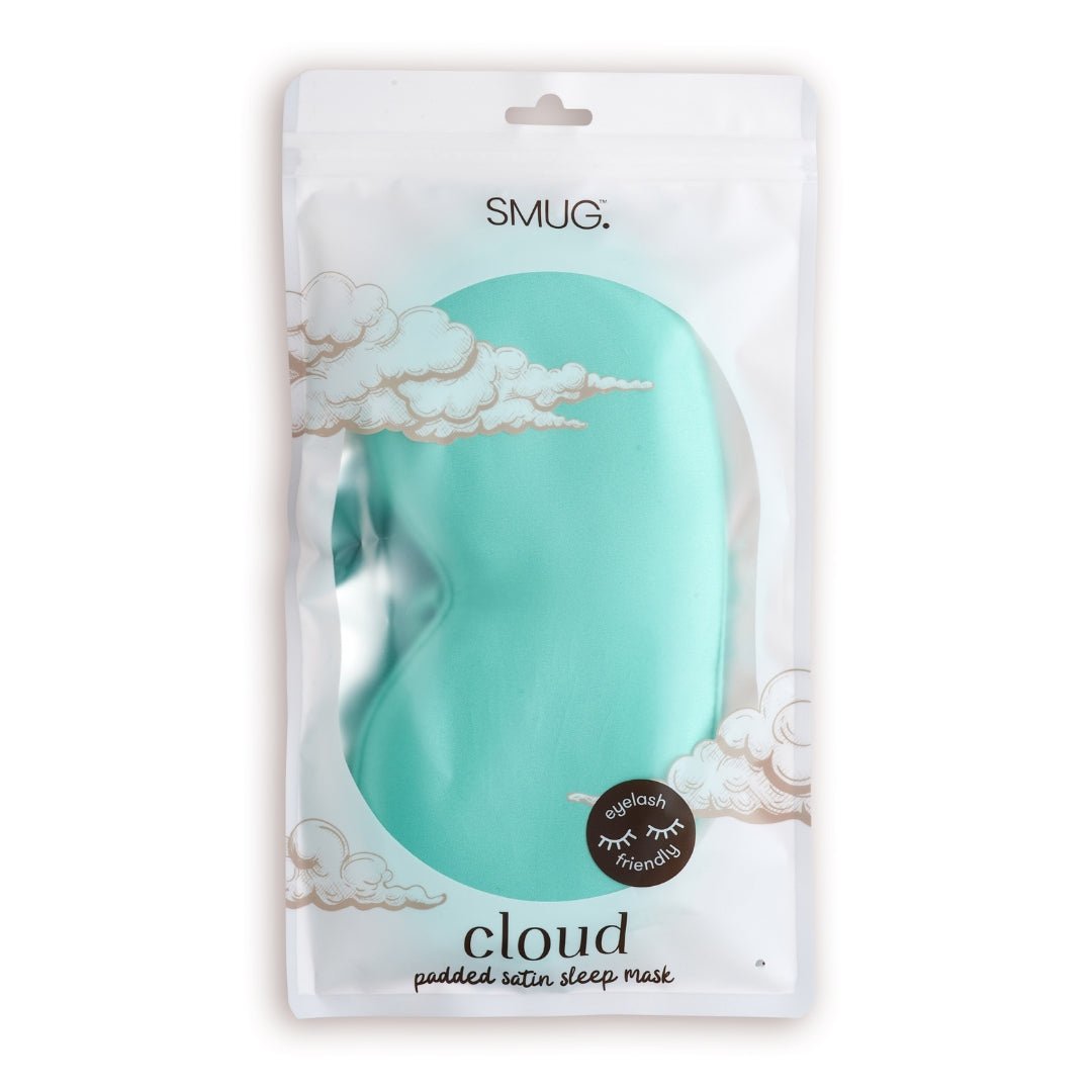 SMUG Cloud Padded Satin Sleep Mask in aqua color, soft and comfortable for restful sleep, shown in its packaging.