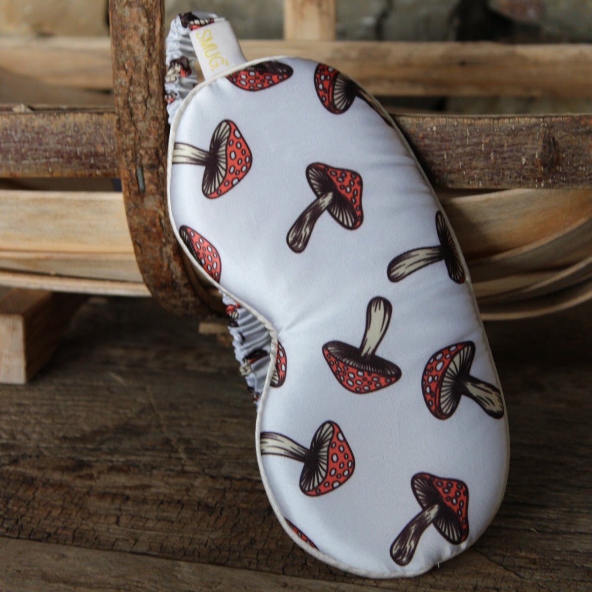 SMUG cloud padded satin sleep mask featuring a whimsical toadstool print, designed for comfortable sleep and relaxation.