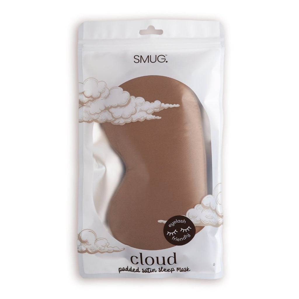 SMUG Cloud Padded Satin Sleep Mask in Mocha resting on packaging, showcasing soft satin fabric and plush cloud design for sleeping comfort.
