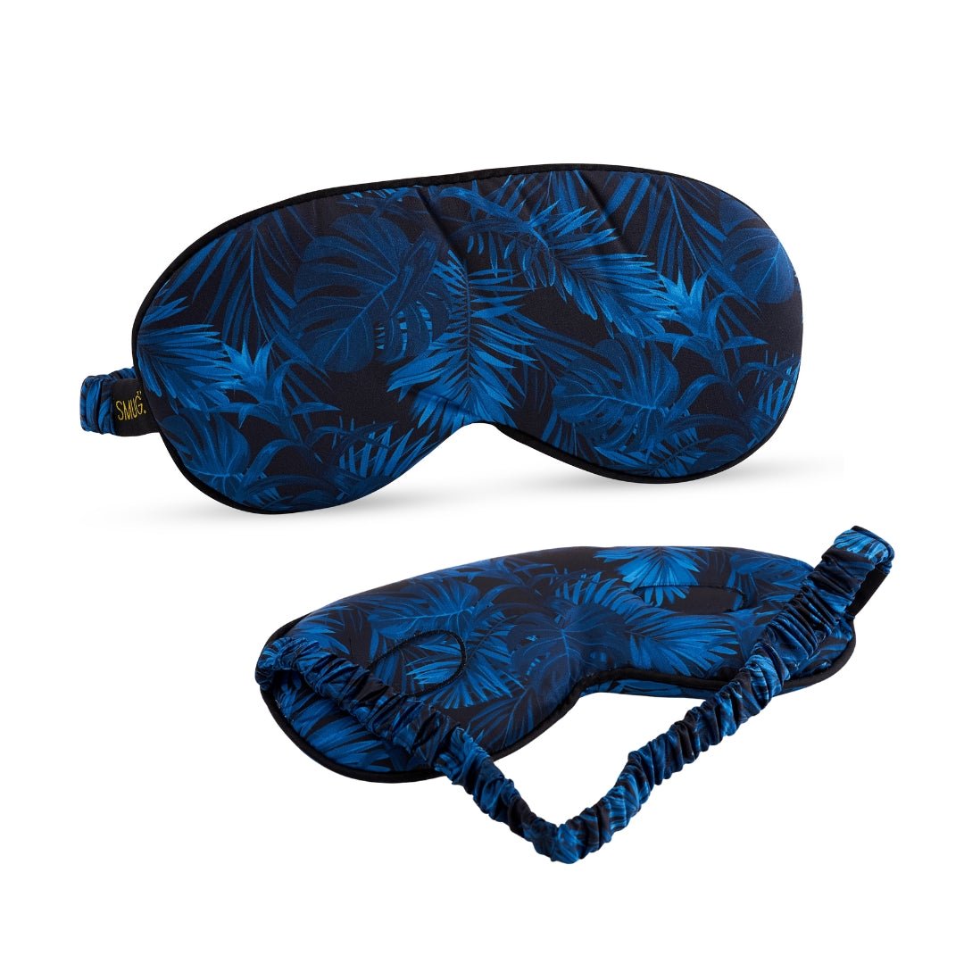 SMUG Cloud Padded Satin Sleep Mask with palm noir print, soft and comfortable for restful sleep.