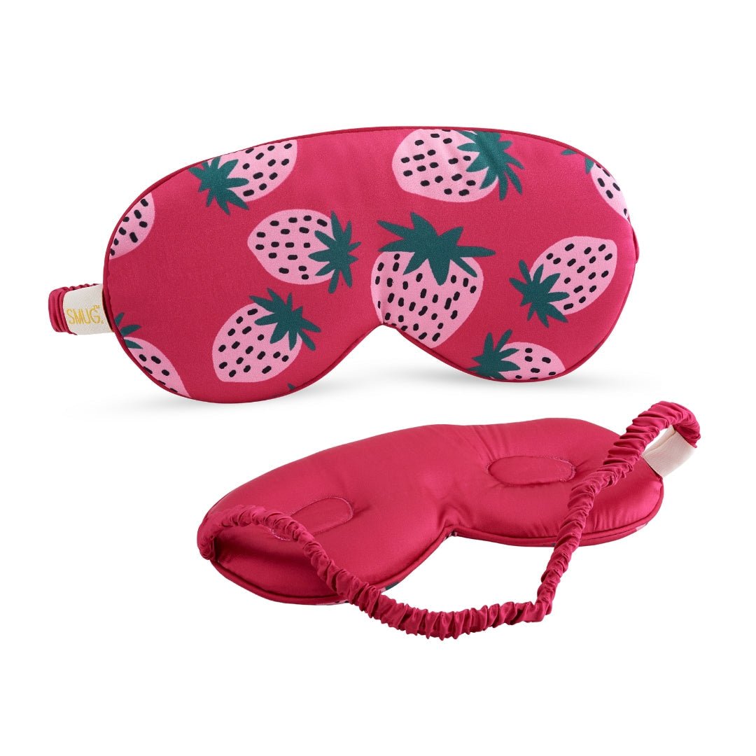 SMUG Cloud Padded Satin Sleep Mask in Strawberry Dreams print with soft, plush cushioning and adjustable strap for comfortable sleep.