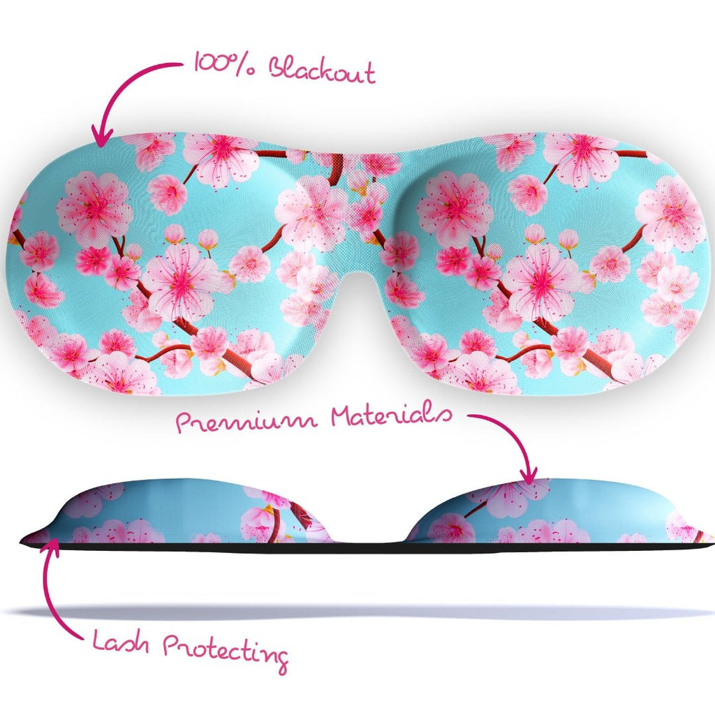 Contoured 3D blackout sleep mask by SMUG with cherry blossom tree print, featuring a comfortable fit and stylish design.